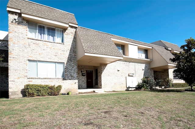 view of front of home with a front yard