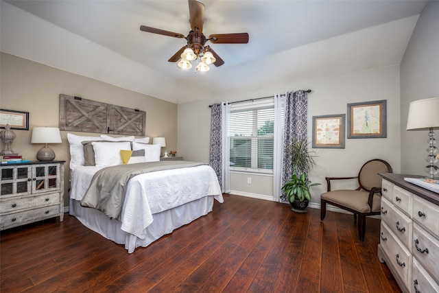 bedroom featuring ceiling fan and dark wood-type flooring