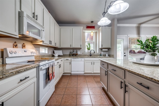 kitchen featuring white cabinetry, light stone counters, decorative light fixtures, white appliances, and light tile patterned floors