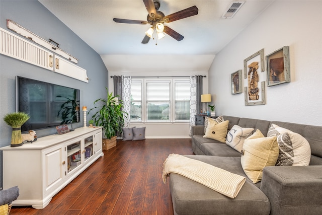 living room featuring ceiling fan, dark wood-type flooring, and lofted ceiling