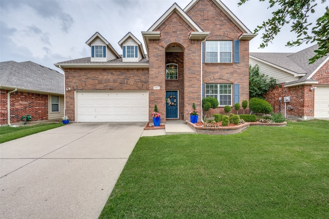 front facade with a garage and a front yard