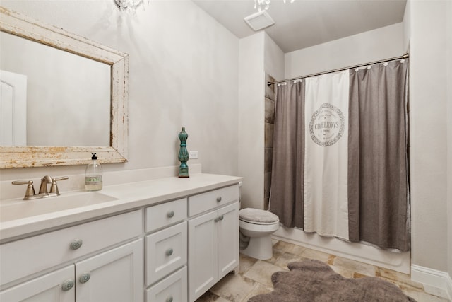 full bathroom with toilet, vanity, and shower / tub combo with curtain