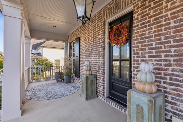 doorway to property with covered porch