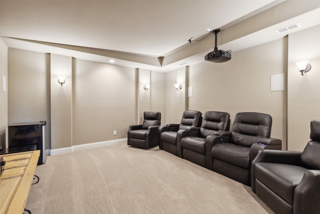 home theater with light colored carpet