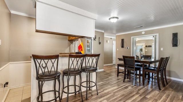 dining space featuring hardwood / wood-style flooring and ceiling fan