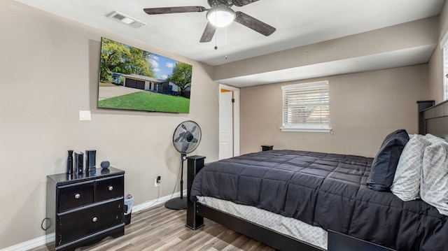 bedroom featuring ceiling fan and wood-type flooring