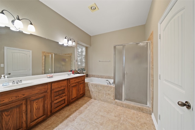 bathroom featuring vanity, tile patterned floors, and independent shower and bath