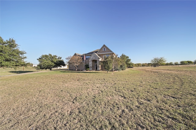 view of front facade with a front lawn