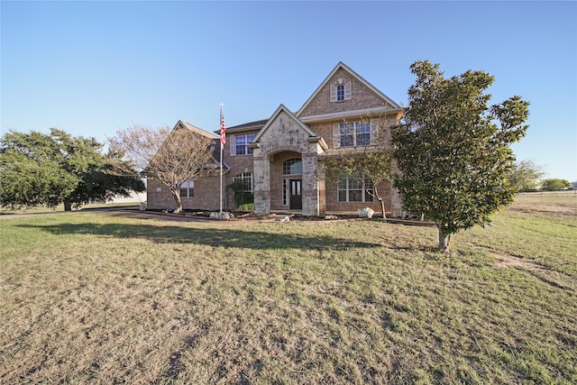 view of front facade with a front yard