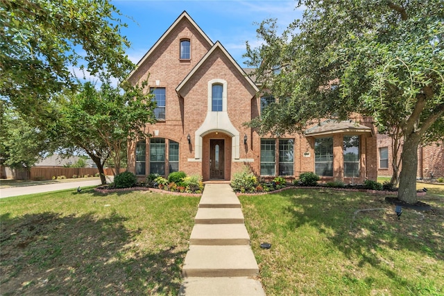 view of front of home with a front lawn