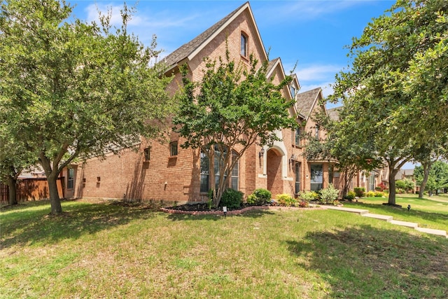 view of front of home with a front lawn