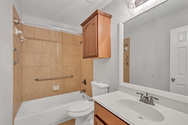 full bathroom featuring vanity, toilet, and tiled shower / bath