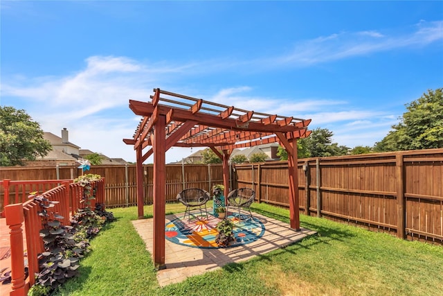 view of yard with a pergola and a patio