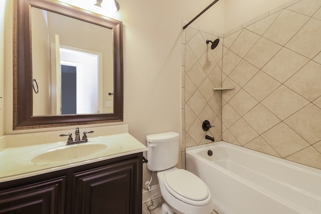 full bathroom with toilet, vanity, and tiled shower / bath combo