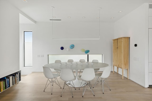 dining area with light wood-type flooring