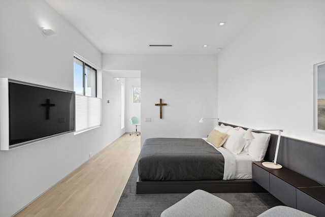 bedroom featuring hardwood / wood-style flooring