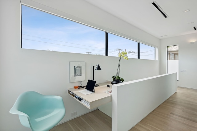 office space featuring light hardwood / wood-style floors