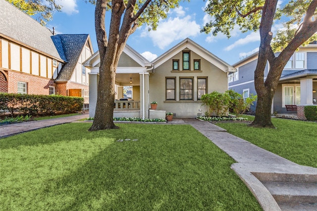 view of front of house featuring a porch and a front yard