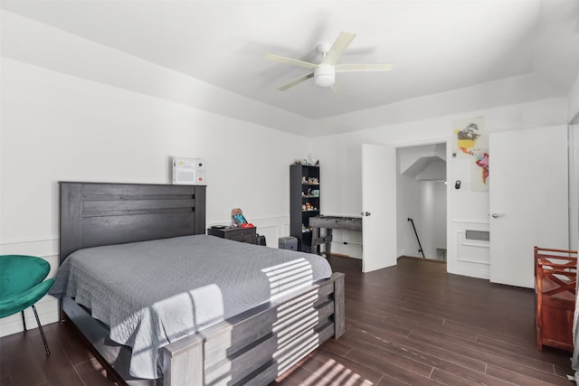 bedroom featuring ceiling fan and dark hardwood / wood-style flooring