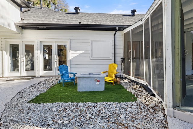 rear view of house with a sunroom