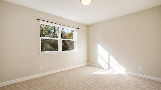 view of carpeted spare room