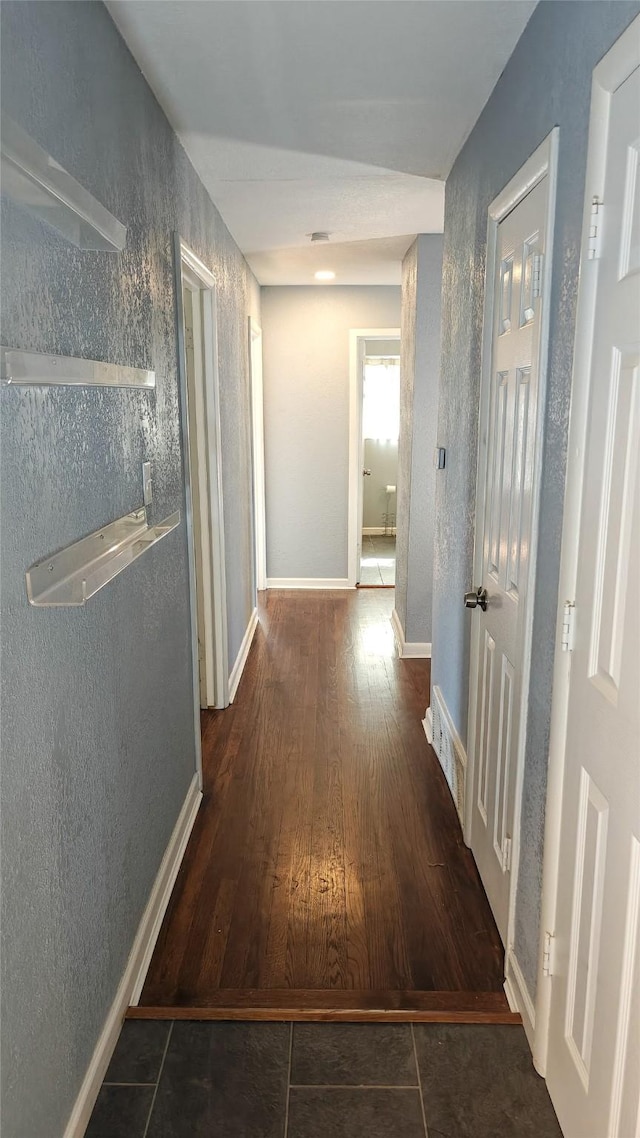 hall featuring dark hardwood / wood-style floors