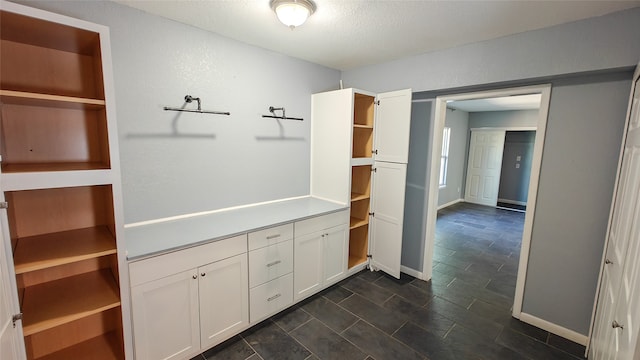 bathroom featuring a textured ceiling