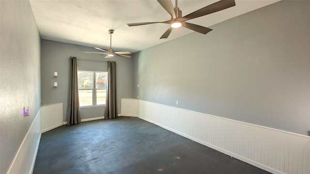 spare room with ceiling fan and radiator heating unit