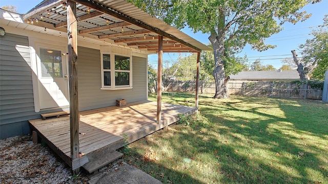 view of yard featuring a wooden deck