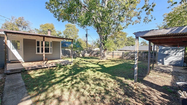 view of yard featuring a wooden deck