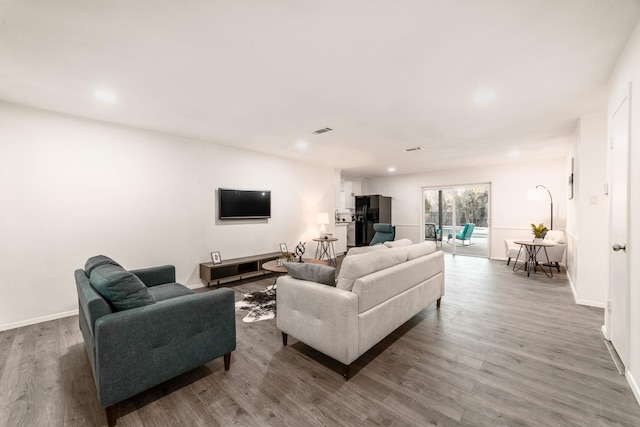 living room featuring wood-type flooring