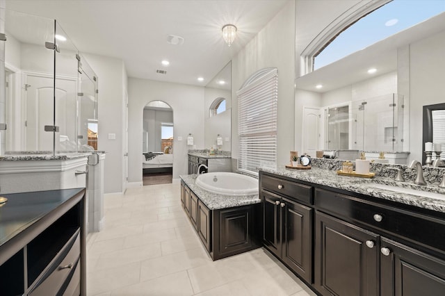 bathroom with tile patterned floors, ensuite bath, a stall shower, visible vents, and plenty of natural light