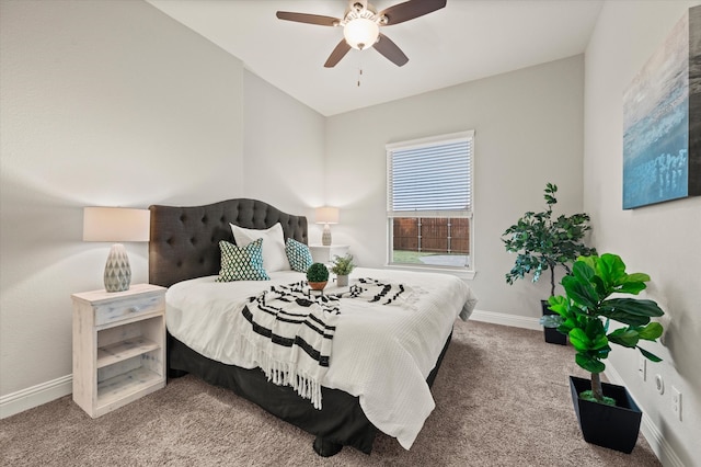 carpeted bedroom featuring ceiling fan and lofted ceiling