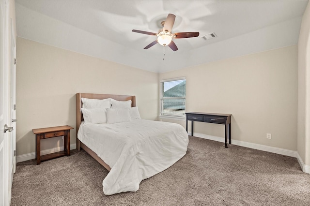 carpeted bedroom featuring baseboards, visible vents, a ceiling fan, and vaulted ceiling