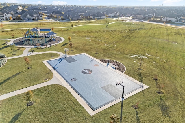 birds eye view of property with a residential view