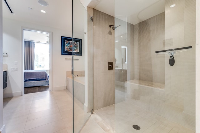 bathroom with separate shower and tub, tile patterned flooring, and vanity