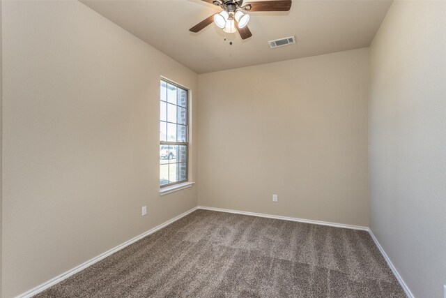 unfurnished room with ceiling fan and carpet floors