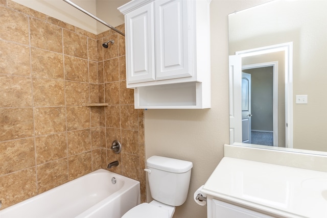 full bathroom with vanity, toilet, and tiled shower / bath