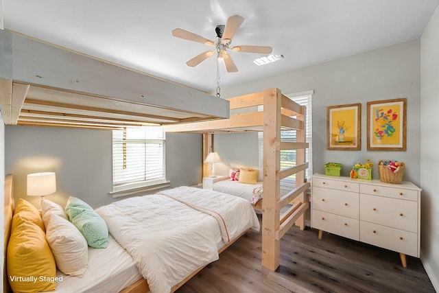 bedroom featuring dark wood-type flooring and ceiling fan