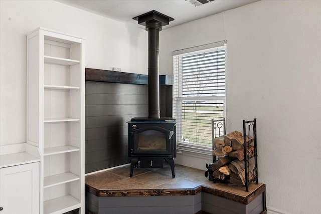 interior details with built in features and a wood stove