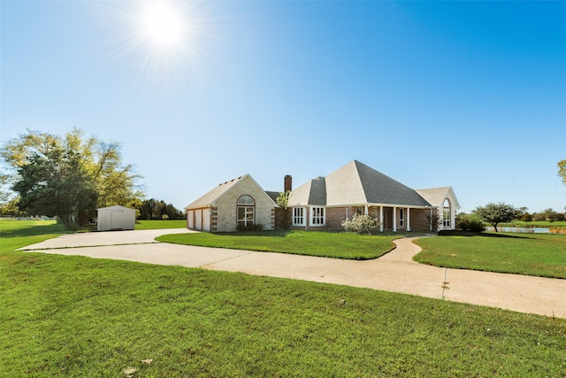 view of front of home with a front lawn