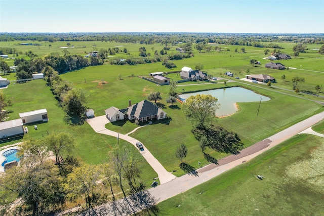 bird's eye view featuring a water view and a rural view