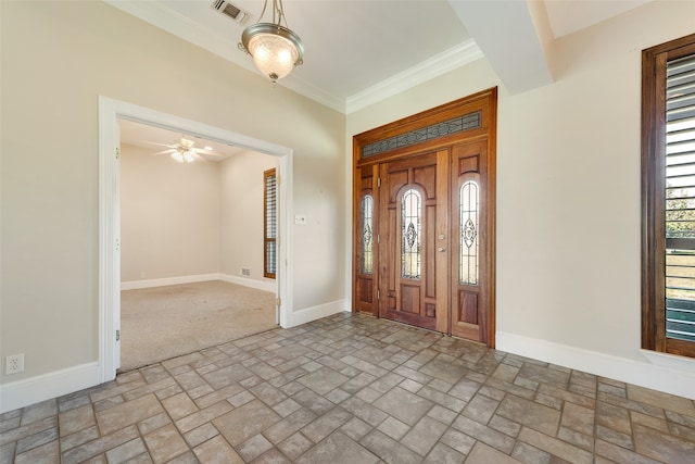 entrance foyer featuring crown molding