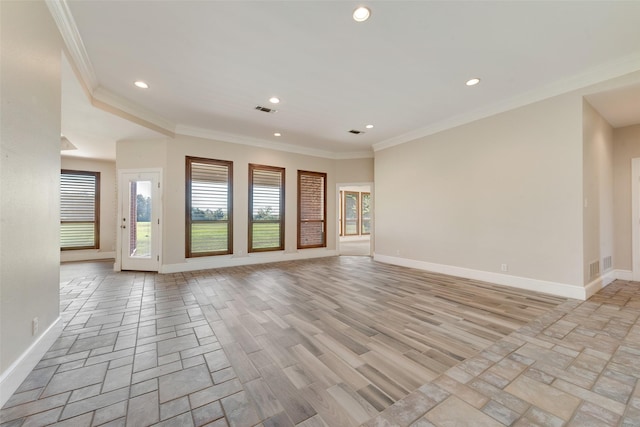 unfurnished living room featuring crown molding and light hardwood / wood-style floors