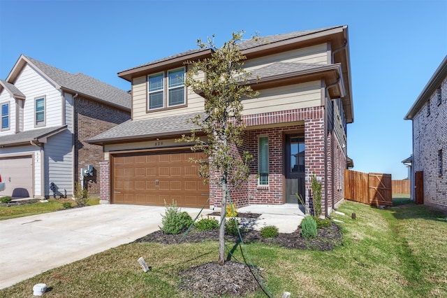 view of front of property featuring a garage and a front lawn