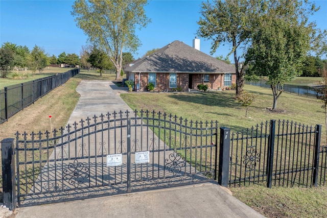 view of front of property with a front lawn