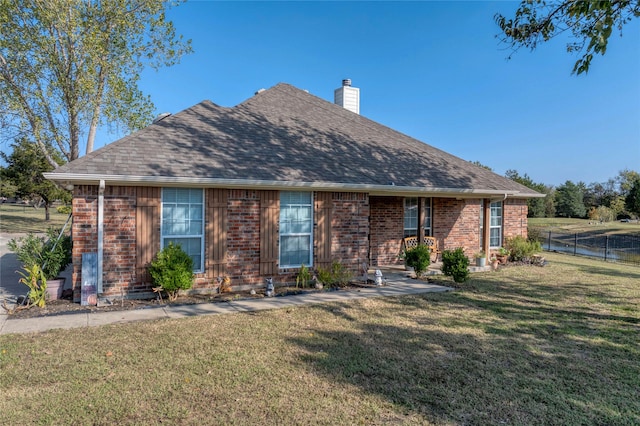 view of front of home with a front lawn