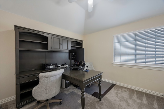 carpeted office featuring ceiling fan