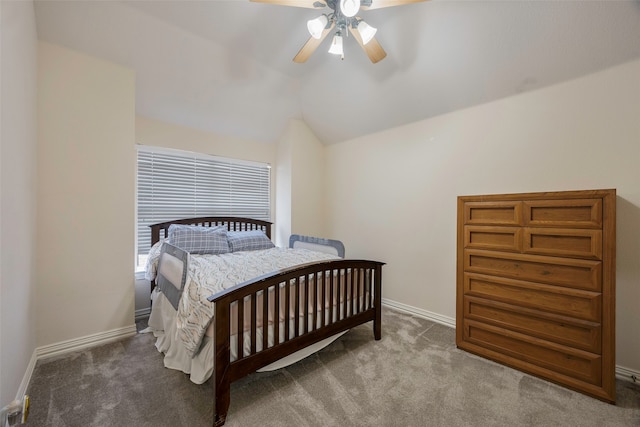 bedroom featuring carpet flooring, ceiling fan, and vaulted ceiling