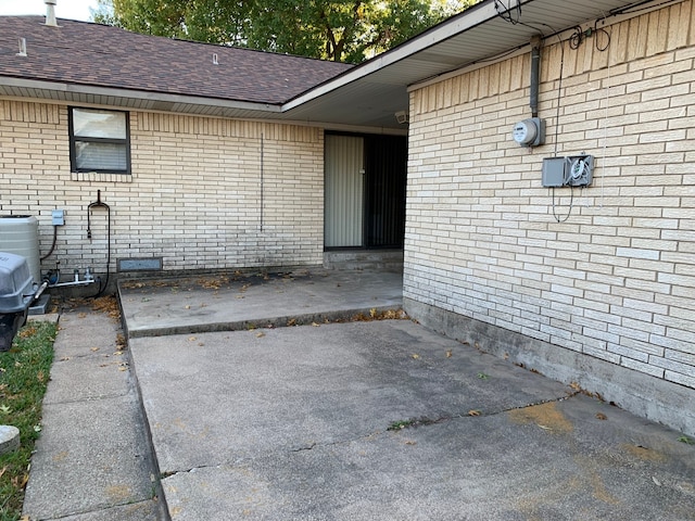 property entrance with a patio area